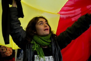 Woman holding a flag at demonstration for a republic