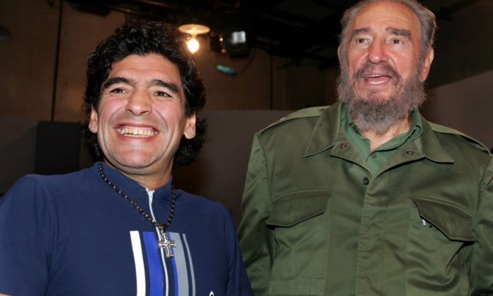 Diego Maradona smiles broadly beside Fidel Castro