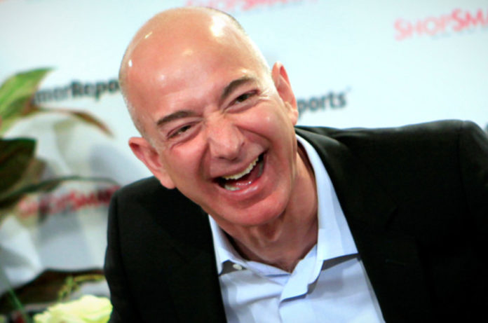 Jeff Bezos laughing