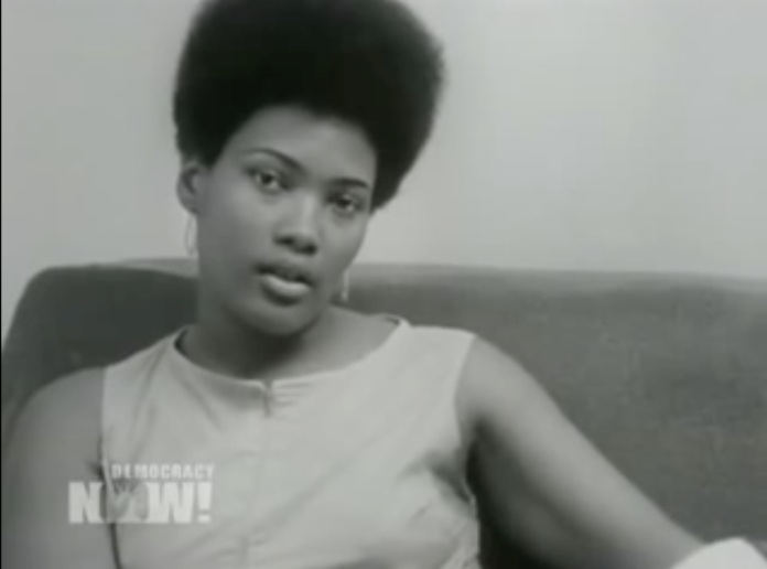 A still from a black and white interview of Akua Njeri in the 1960s.