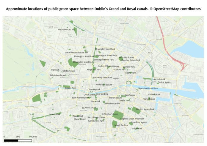 A map of Dublin City with a number of dark green marks to indicate where there are public green spaces.